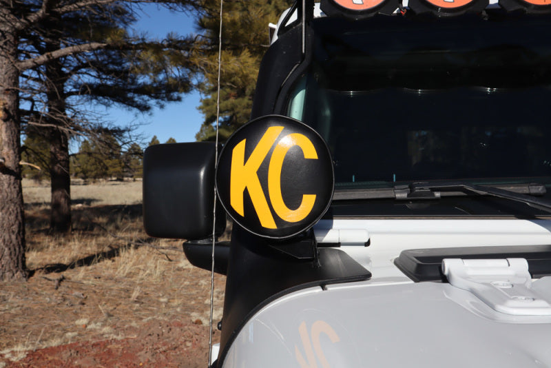 KC HiLiTES 6in. Round Soft Cover (Pair) - Black w/Yellow KC Logo